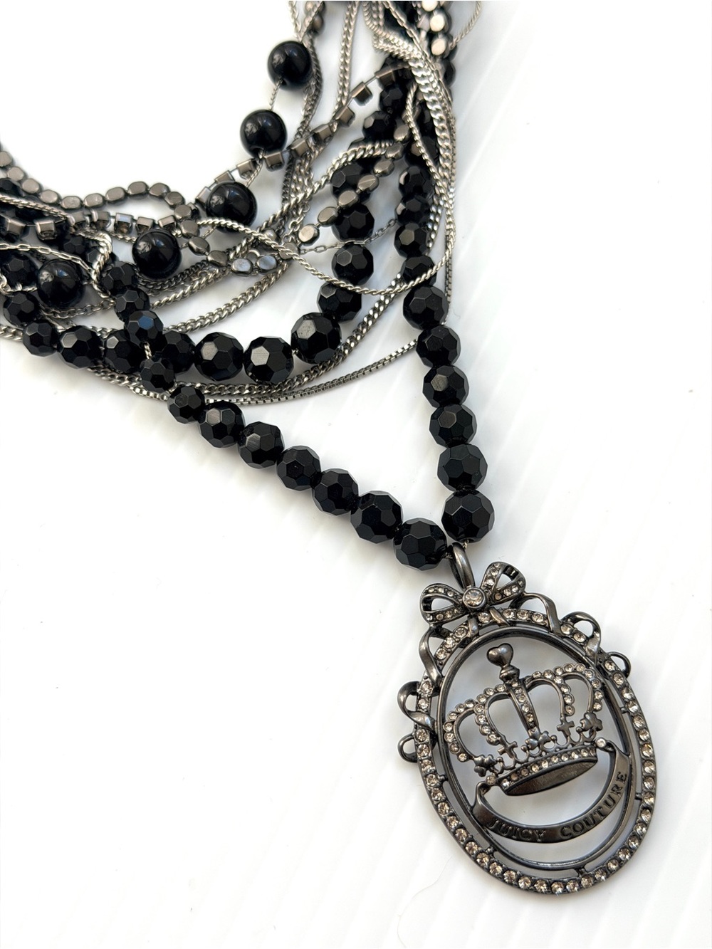 Juicy Couture Black Multi-Strand Beaded Necklace with Crown Pendant in Box